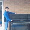 This is the author, with the piano that he is now storing on his back porch.
