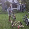 Gabor Lukacs with his DIY bamboo bike trailer. Photo by Cris Carl.