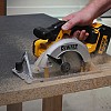 A carpenter uses a circular saw. (Photo: toosstop/Flickr)