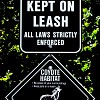 A sign warns residents to keep pets on leash due to coyotes. (Photo: marganz/sxc.hu.)