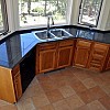 Granite tile counter top and photo by KMS Woodworks.