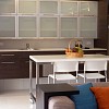 A wall oven, undermount sink, and vertical storage make the most of this small kitchen. (Lighthousebay/istockphoto.com)
