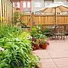 A privacy fence and garden protect an urban garden. (Photo: ImagesbyDebraLee/istockphoto.com)
