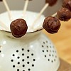 Photo of cake pops drying in a colander by Claire Sutton/Flickr Creative Commons. 