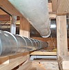 These radon pipes provide a safe ventilation route for the gas. Photo: Chris Peters/Flickr