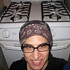 Here is a charming self-portrait taken in front of my freshly cleaned range, right after I cleaned it with toothpaste.