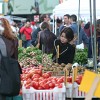 A woman picks fruit at the Union Square Farmer's Market in NYC. (Photo: Terence O'Brien/sxc.hu)