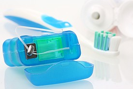 Photo of dental floss by zimmytws/istockphoto.com.