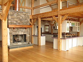 A post and beam kitchen with a purple counter top. Photo: Vermont Timber Works via Wikimedia Commons. 