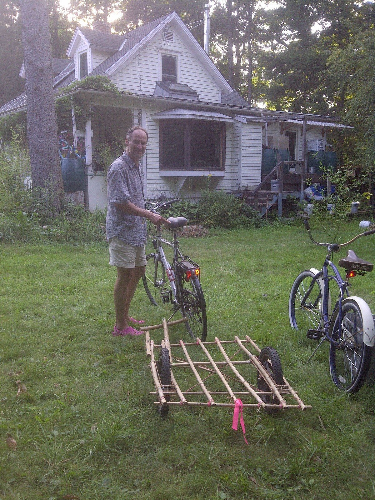 Gabor Lukacs with his DIY bamboo bike trailer. Photo by Cris Carl.