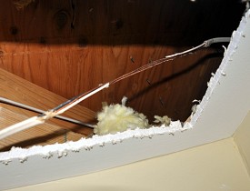 This drywall had to be cut to access electrical wires. Photo by Kevin Stevens.