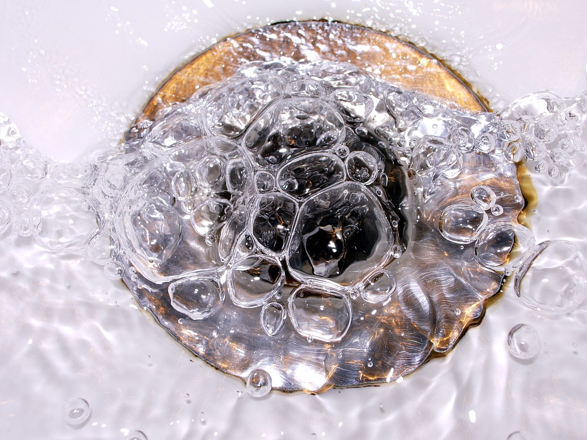 Photo of a drain and bubbles by gugacurado/sxc.hu.