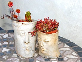 Photo of vases with faces by LynGianni/istockphoto.com