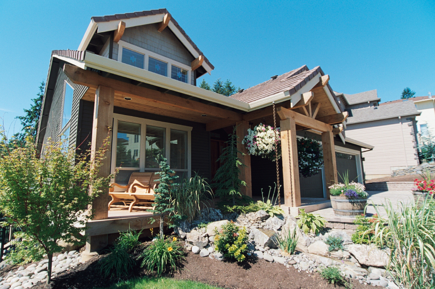 Photo of a house with new windows by sjharmon/istockphoto.com.