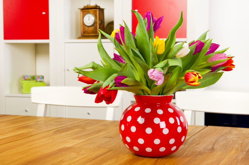 Photo of a beautiful vase of spring tulips by IvonneW/istockphoto.com.