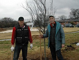 Gene Hyde, planting a tree with the CEO of the Volkswagen plant in Chattanooga.