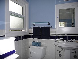 This is a lovely, simple finished bathroom remodel. We like the shade of this blue bathroom. (Photo: lavenderstreak/Flickr)
