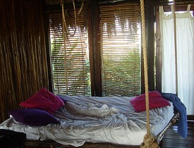 A tropical hanging bed via Selkie30 in Flickr.