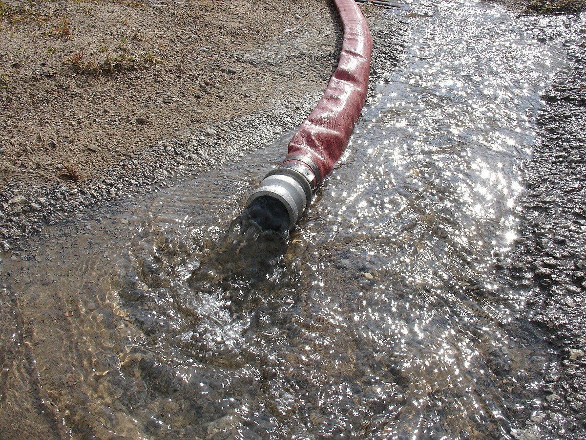 A sump pump in a flooded basement.  Photo: dewlittle/stock.xchng