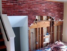 I stripped away the Z-BRICK and drywall and installed new drywall in this house. (Photo by the author, Kevin Stevens).