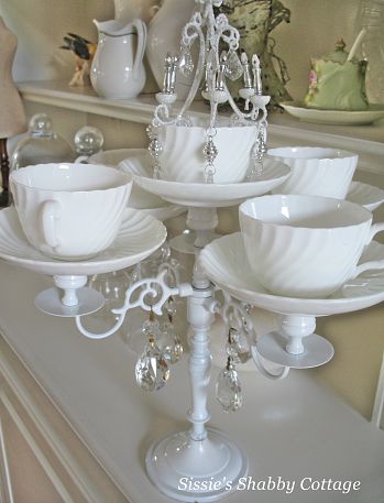 Vintage tea cups and plates are the basis of this inventive DIY candelabra. (Photo: Sissie's Shabby Cottage via Hometalk.com)