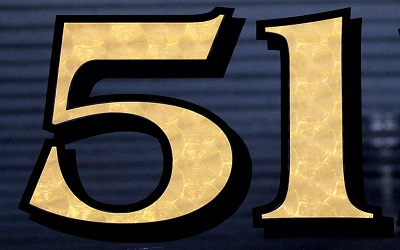 This house number is not hand gilded. It is 23.5K gold on vinyl. Photo and number by The House Number Lab.