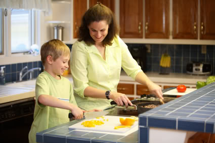 Mother and son cooking