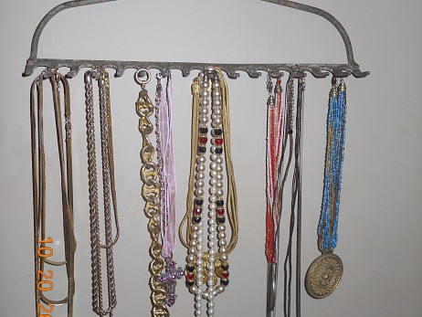 Rake head necklace rack by Lee Anne Culpepper.