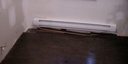 Newly installed electric baseboard heater Andrew Lin / flickr