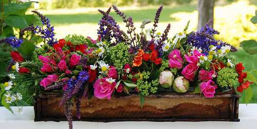 A DIY floral centerpiece like this makes a beautiful Mother's Day gift. Photo by hello-julie/Flickr Creative Commons.