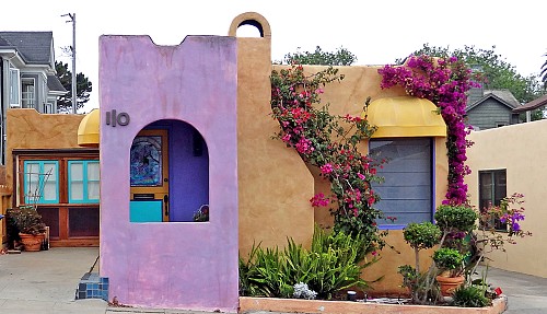 Painted stucco house by GPA Photo Archive/flickr