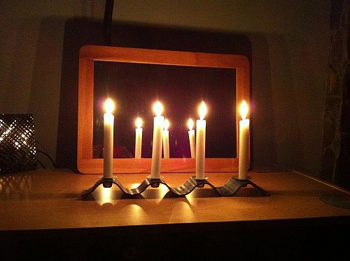 Candles in power outage by Amber Strocel/flickr    