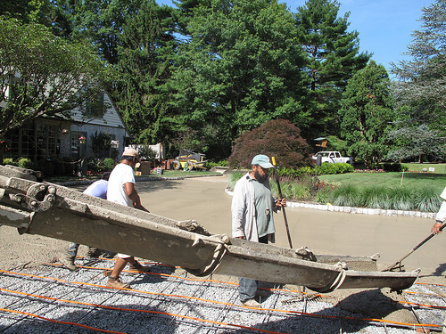 pouring concrete base for brick driveway installation IMG_1512
