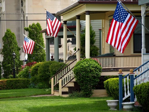 Flags fly appropriately on staffs. Photo by summersetretrievers/istockphoto.com