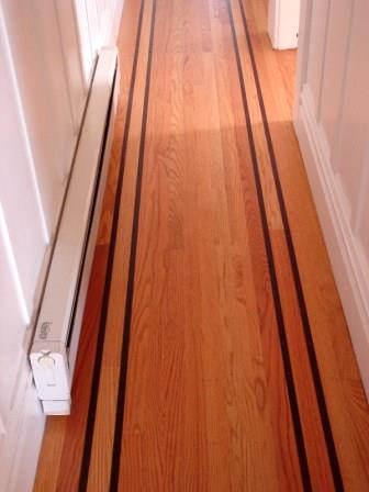 Hallway electric baseboard heater Mike Linksvayer / Public domain