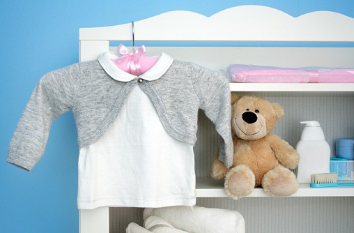 Photo of baby clothes by Kasiam/istockphoto.com. 