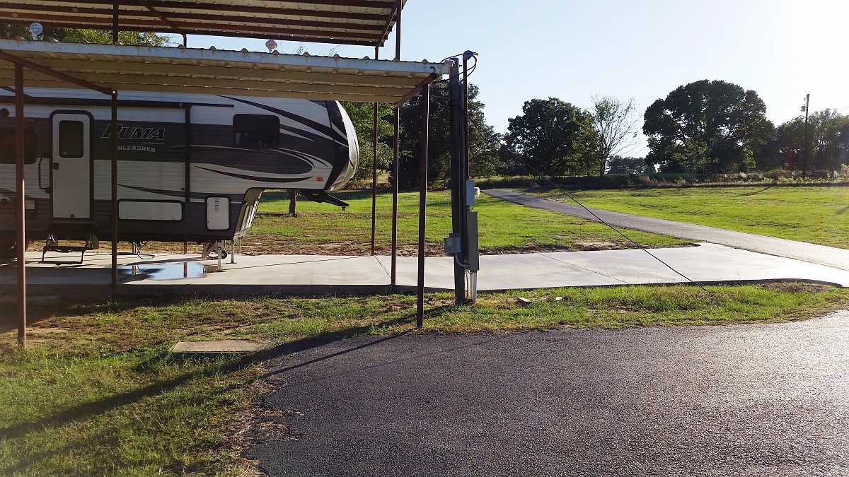 Concrete slab shaded by awning