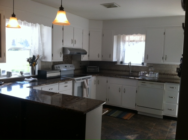 Repainted cabinets to go with new countertops