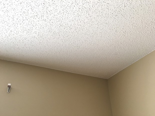 Neat interior paint on popcorn ceiling