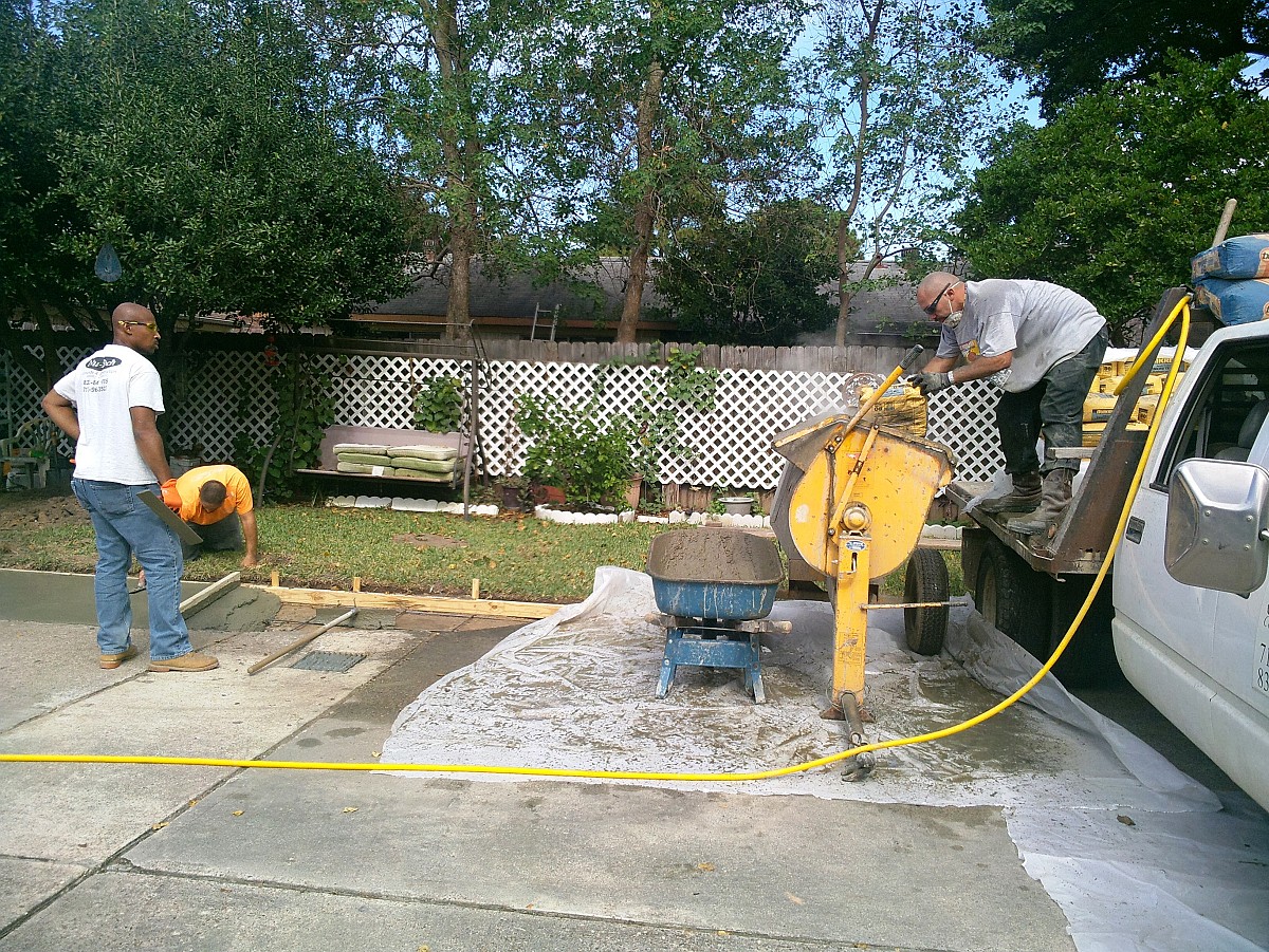 Mixing concrete for our driveway