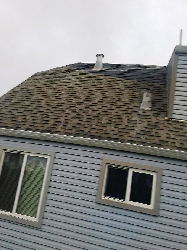 AFTER Excellent repair of Cape Cod roof