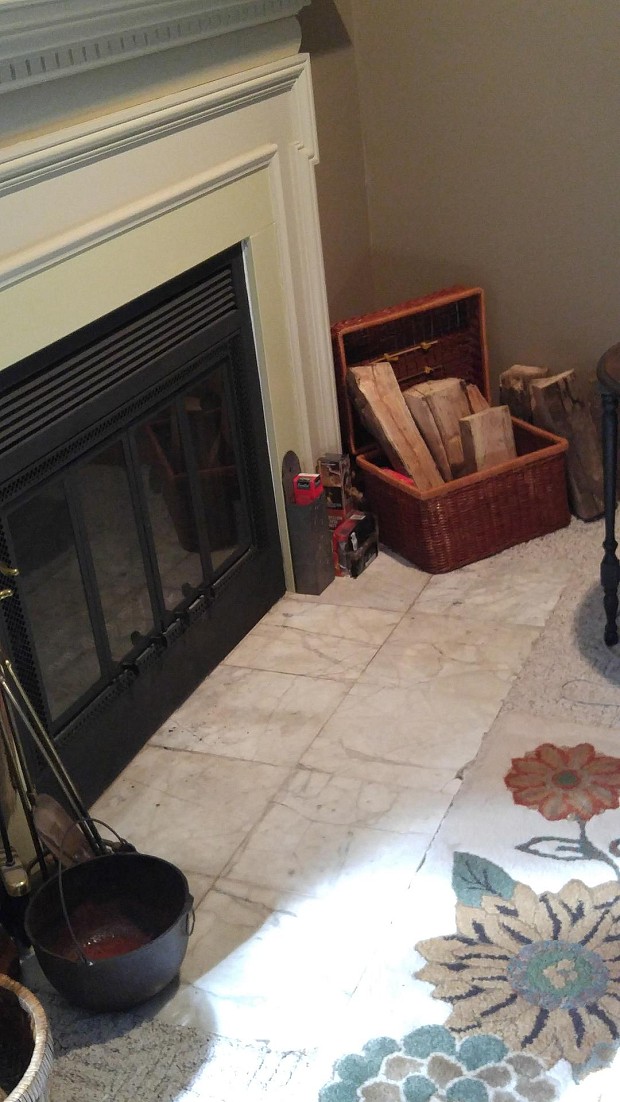 BEFORE: Damaged marble hearth
