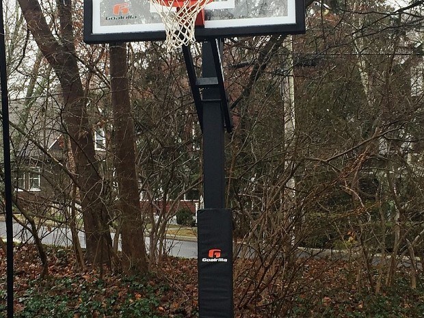 In-ground basketball hoop in the rain