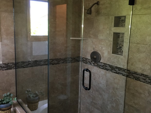 Shower tile with soap and shampoo niches