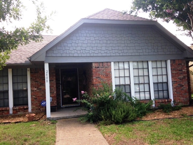 House front after power wash & paint