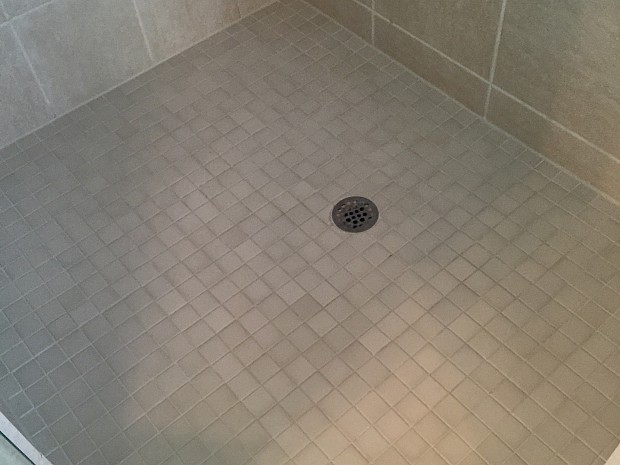BEFORE Worn and dingy grout