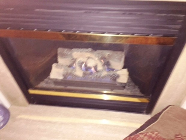 BEFORE Gas fireplace was in bad shape