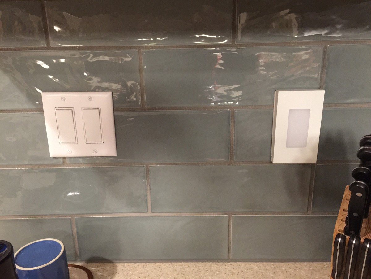 Neat tiling around switchplates