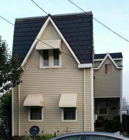 AFTER New roof for a lovely old home