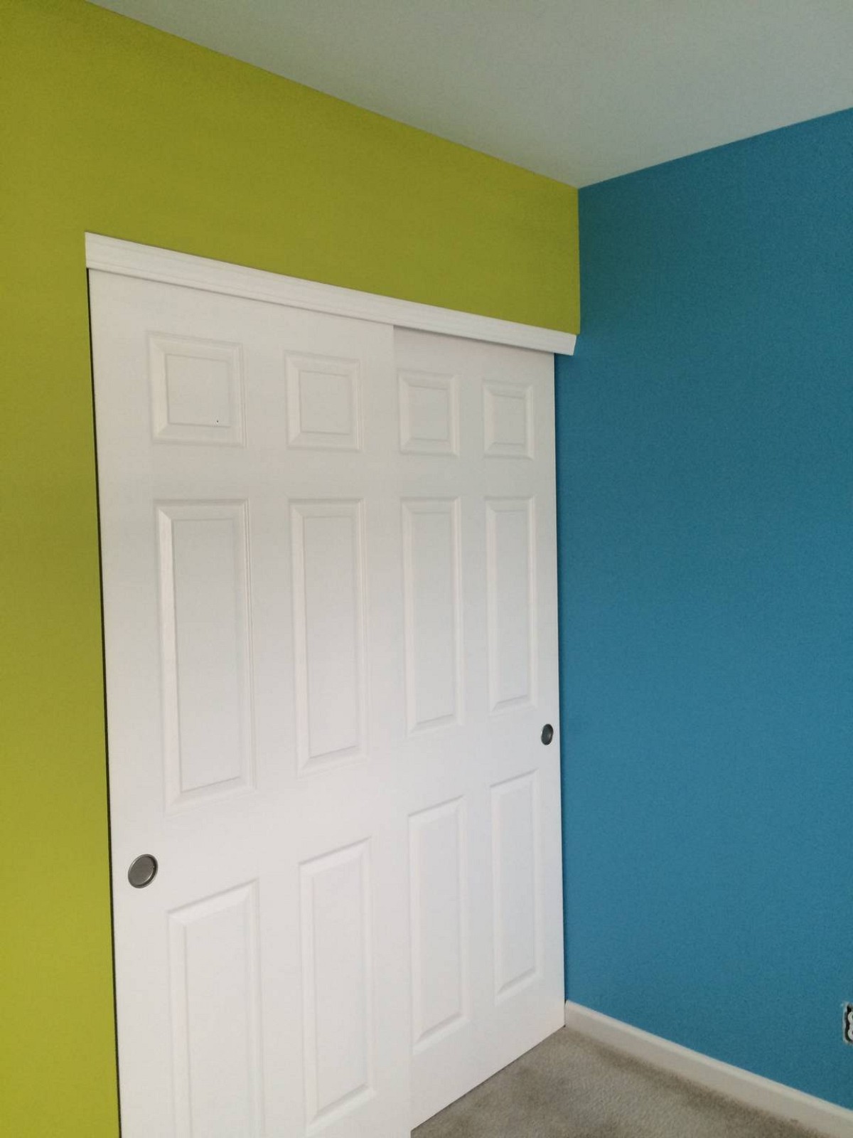 Nursery painted in Monsters, Inc. theme